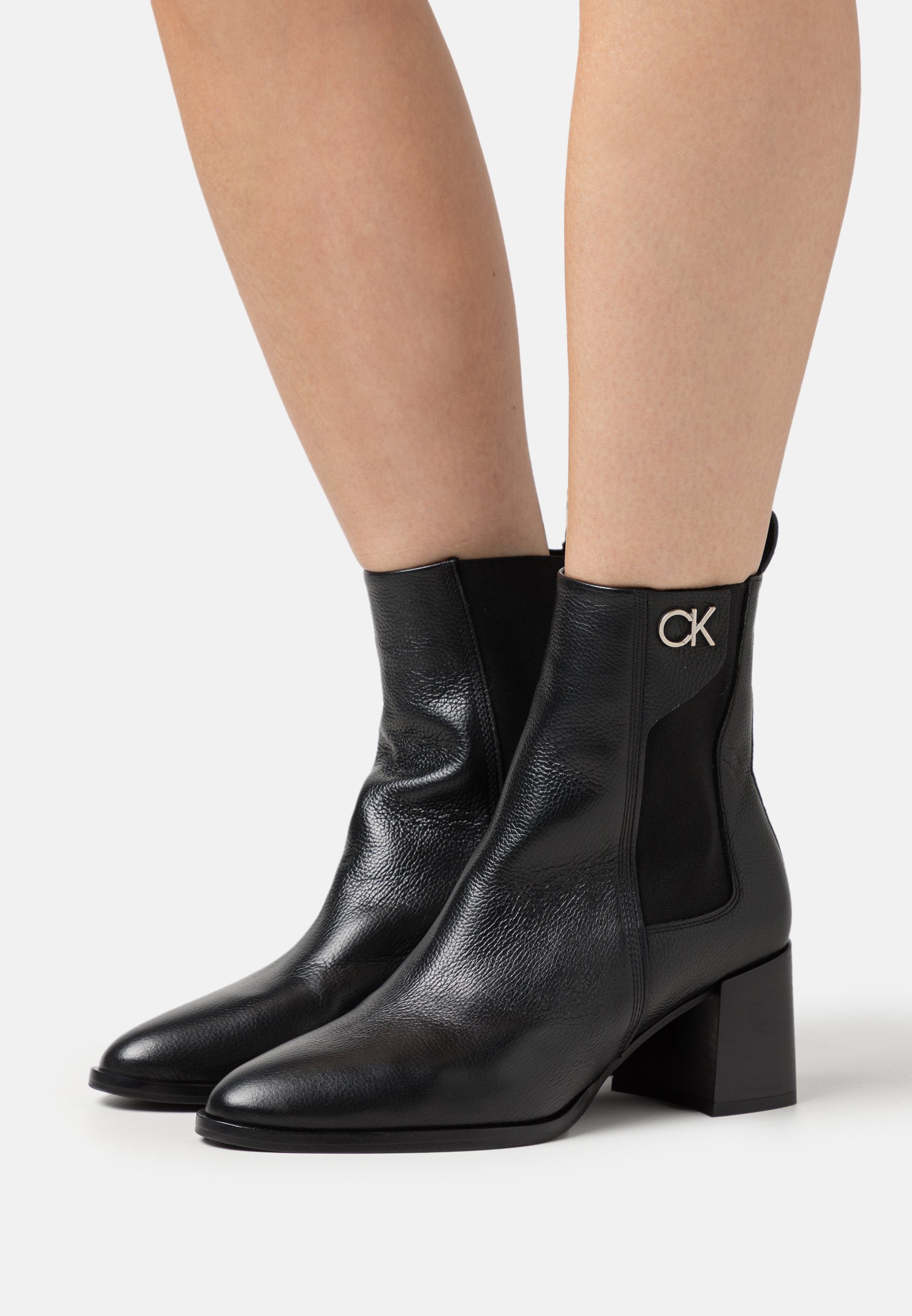 ALMOND - Classic ankle boots