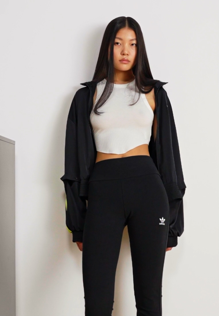 ESSENTIALS FLARED - Leggings - Trousers