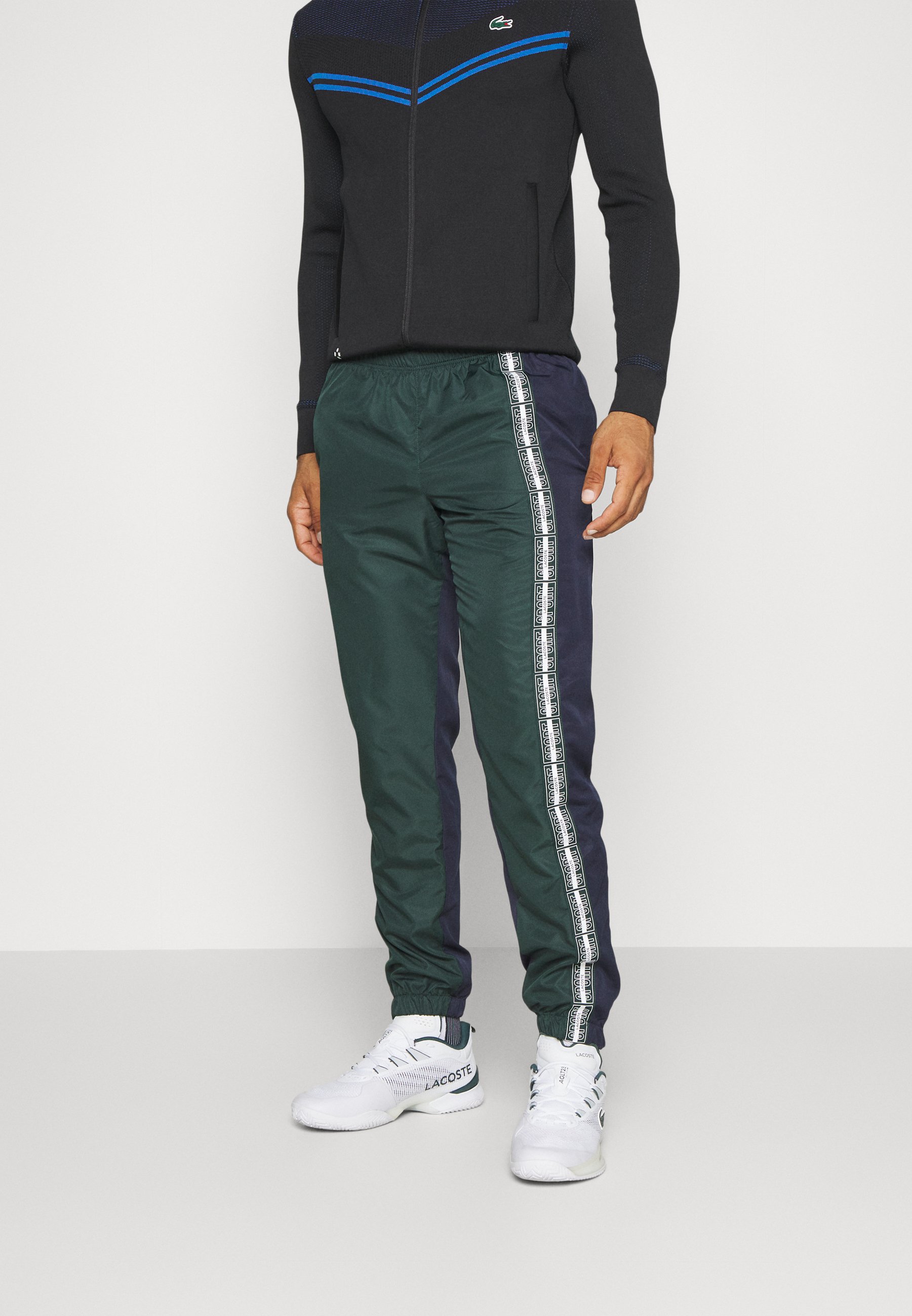 TENNIS PANT - Tracksuit bottoms