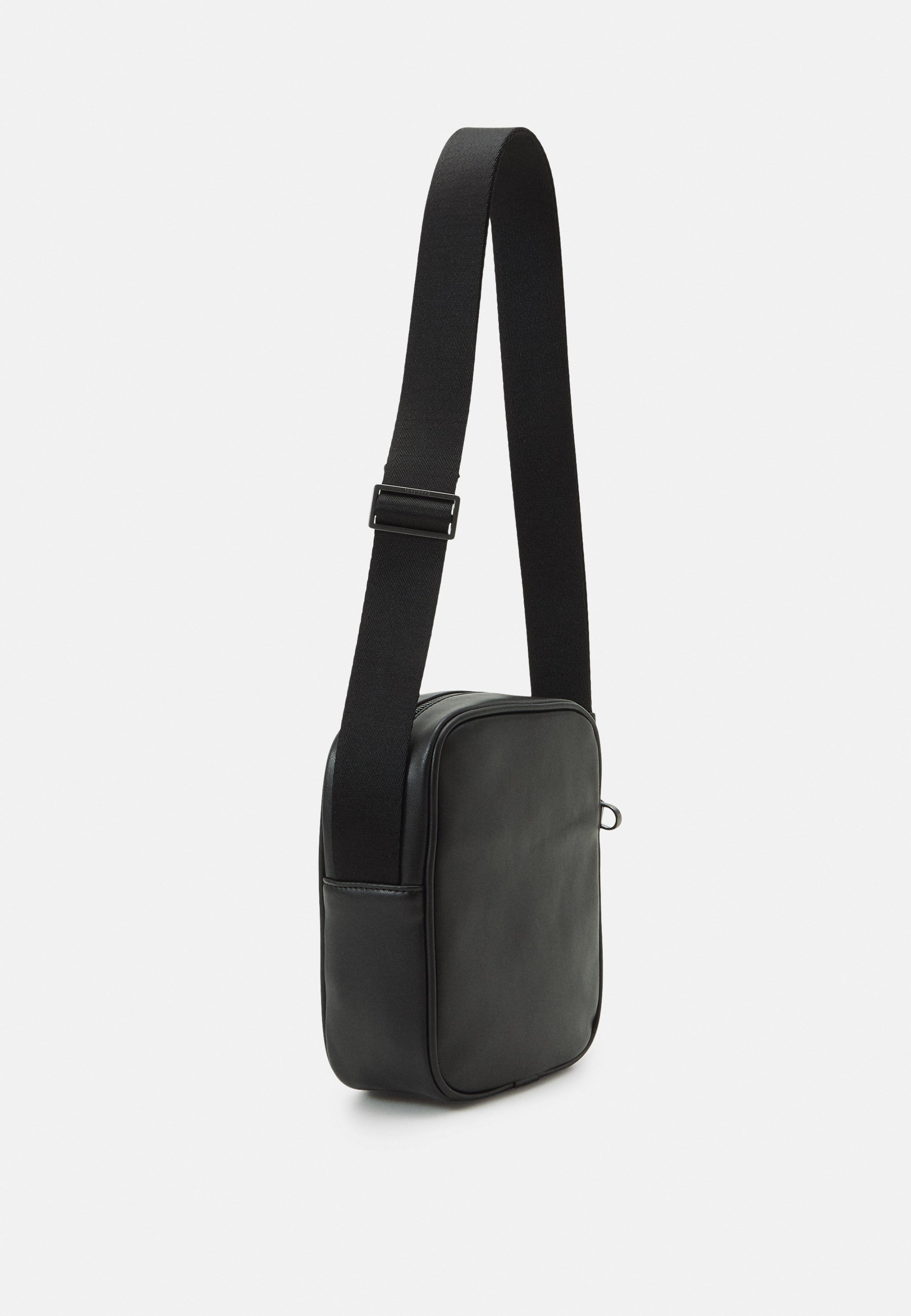 ELEVATED REPORTER UNISEX - Across body bag