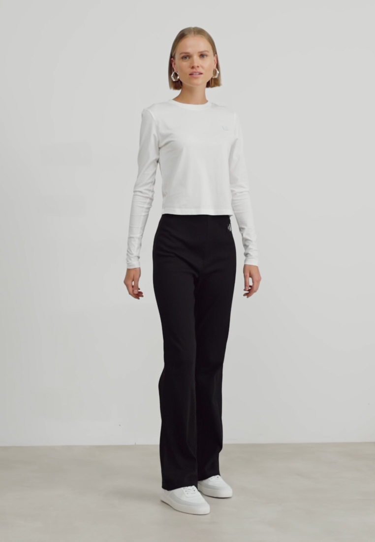 LABEL STRAIGHT PANTS - Trousers