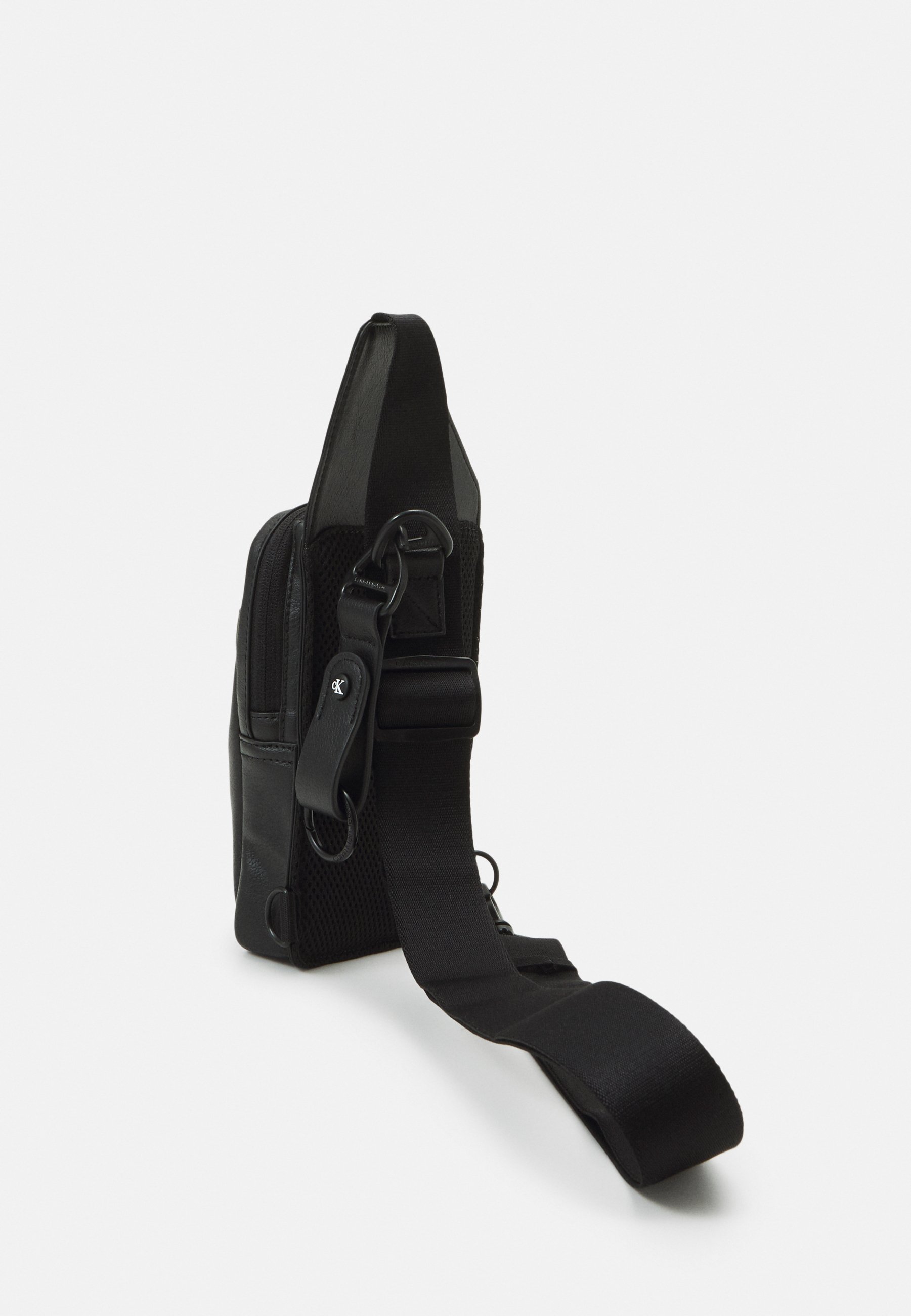 TAGGED ANGLED PHONE CROSSBOY UNISEX - Phone case