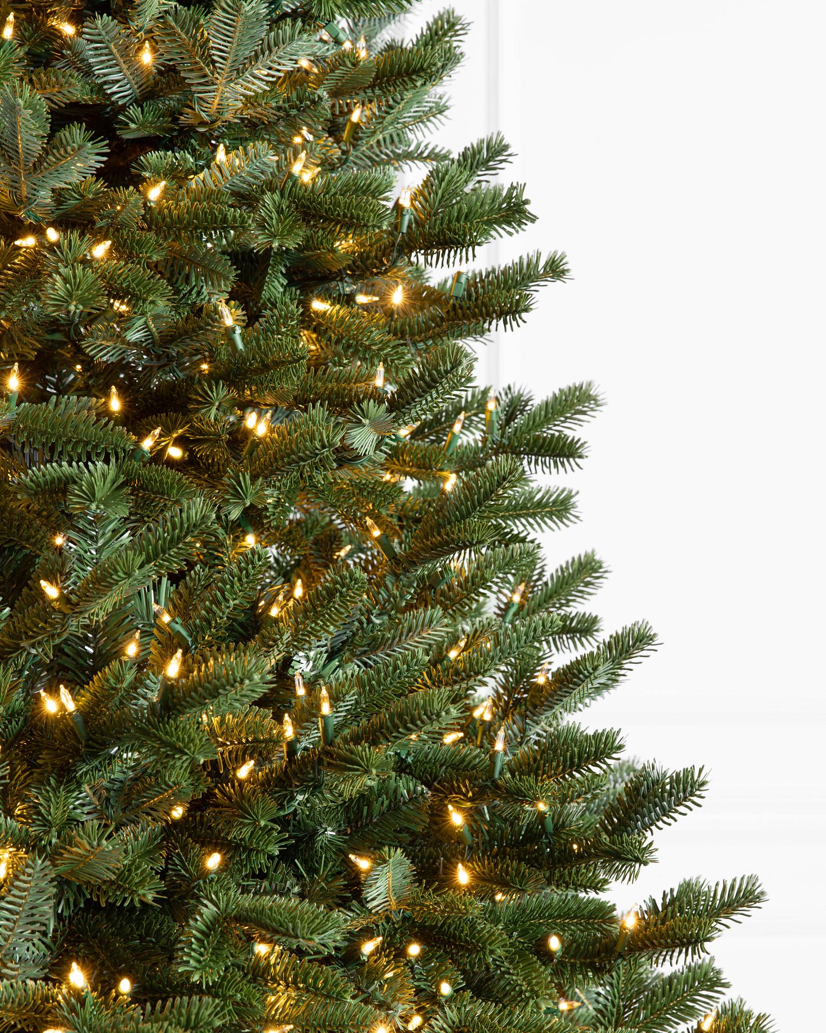 7-1/2 ft. Natural Fraser Medium Fir Hinged Artificial Christmas Tree with 1000 Multicolor Lights