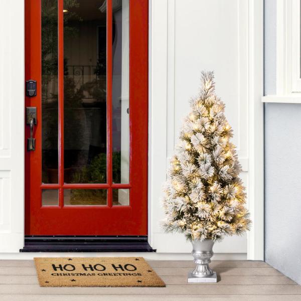 4 ft. Pre-Lit Snow Flocked Pine Artificial Christmas Tree with 100 Warm White Lights