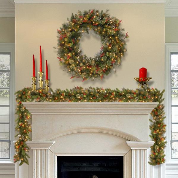 30 in. Wintry Pine Artificial Wreath with Pine Cones, Red Berries, Snow and 100 Clear Lights