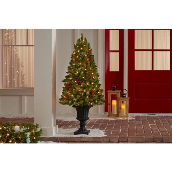 4 ft Winslow Fir Pre-Lit Potted Artificial Christmas Tree with 100 Warm White Mini Lights