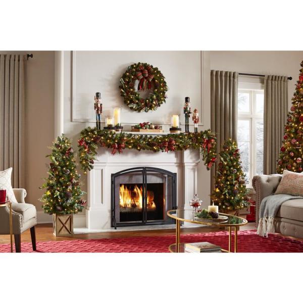 4.5 ft Woodmoore Mixed Pine Potted Pre-Lit Artificial Christmas Tree with 70 Warm White Mini Lights