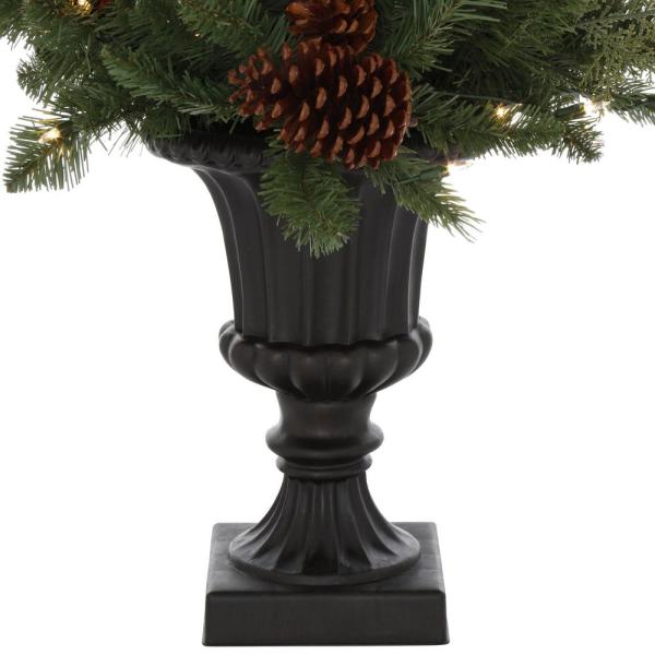 4 ft Winslow Fir Pre-Lit Potted Artificial Christmas Tree with 100 Warm White Mini Lights