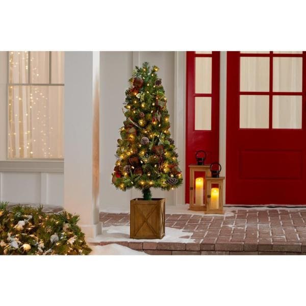 4.5 ft Woodmoore Mixed Pine Potted Pre-Lit Artificial Christmas Tree with 70 Warm White Mini Lights