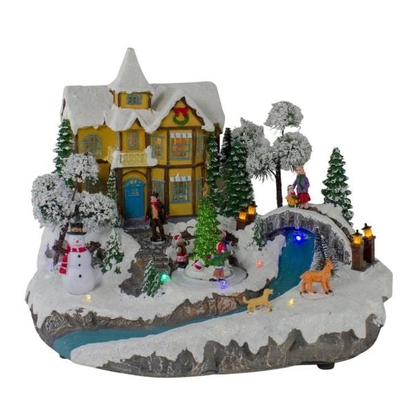 15 in. LED Lighted Yellow Cottage Christmas River Scene with Movement and Music