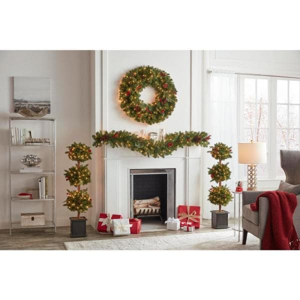 4 ft Winslow Fir Pre-Lit Potted Artificial Topiary Christmas Tree with 150 Warm White Mini Lights
