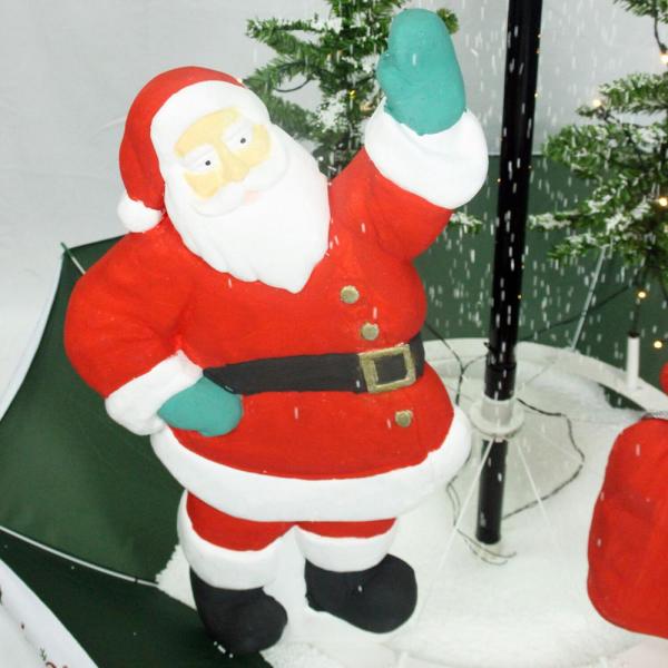 47 in. Christmas Red Santa with Green Umbrella Base and Music