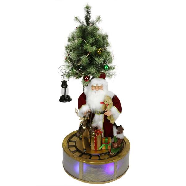 4 ft. Animated and Musical Lighted LED Santa Claus with Tree and Rotating Train Christmas Decor
