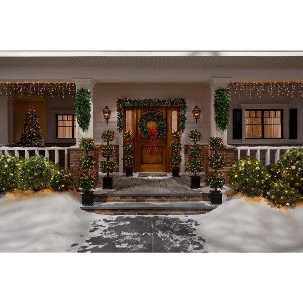 4 ft Winslow Fir Pre-Lit Potted Artificial Topiary Christmas Tree with 150 Warm White Mini Lights