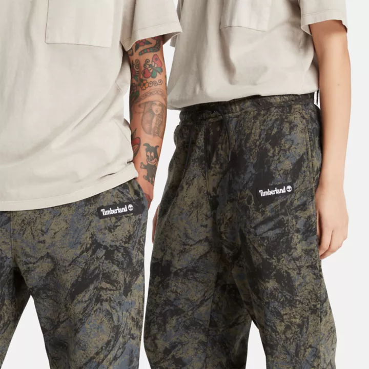 All Gender All-Over Printed Mountains Sweatpants in Camo