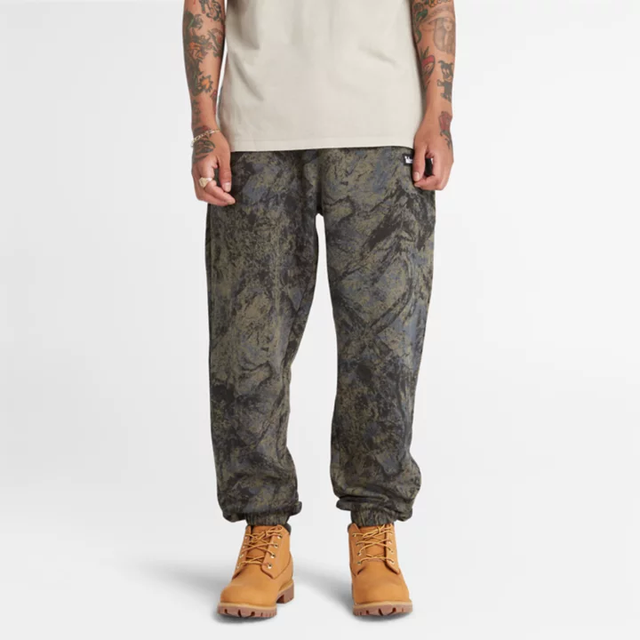 All Gender All-Over Printed Mountains Sweatpants in Camo
