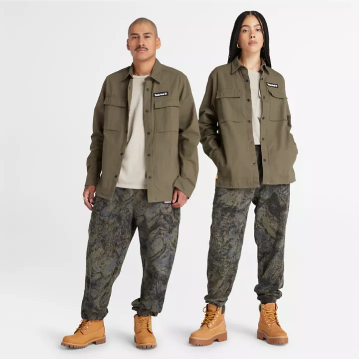 All Gender All-Over Printed Mountains Sweatpants in Camo