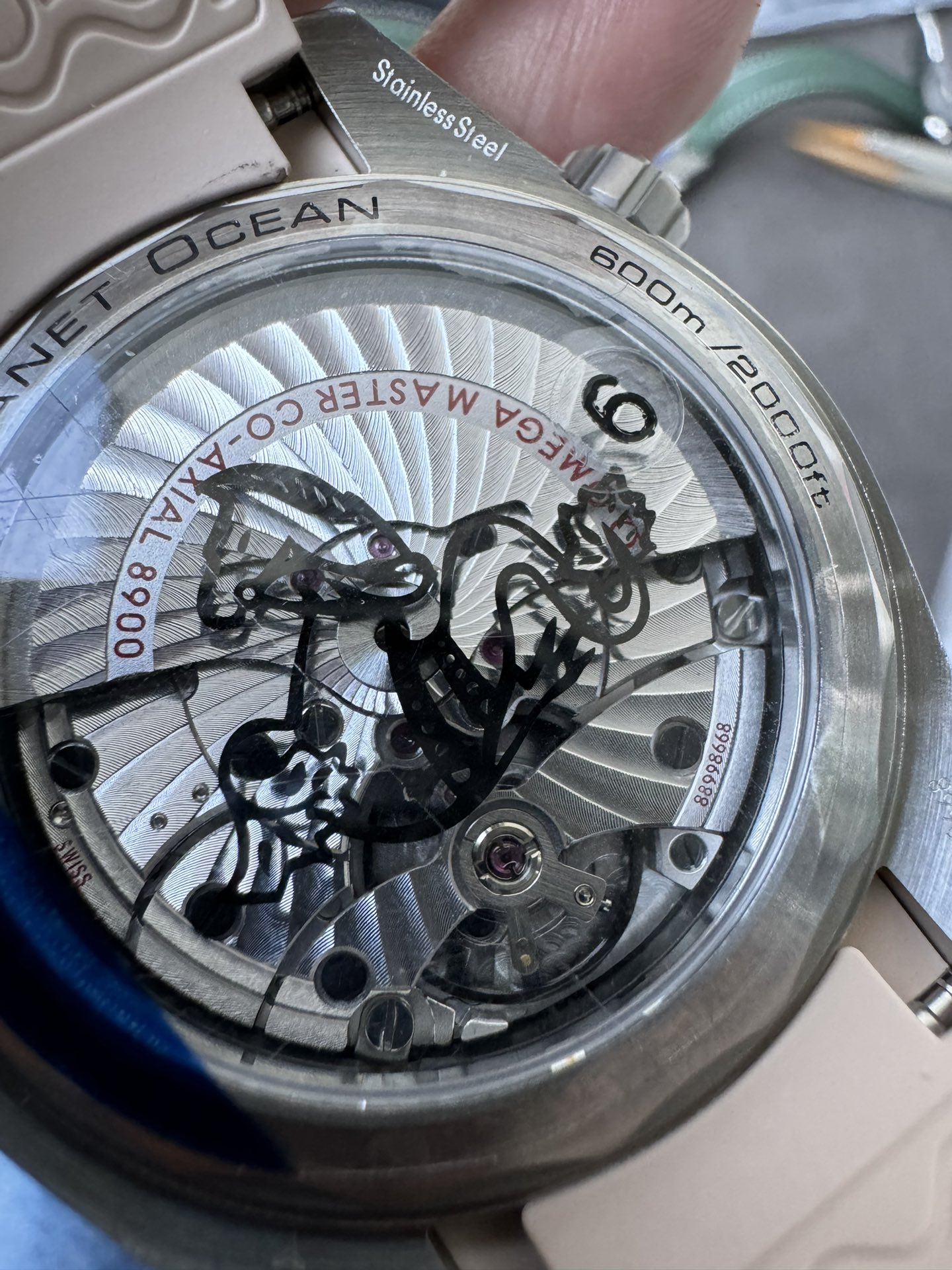 Super Clone 1:1 Omega Seamaster Planet Ocean 600M Cream Pink Dial Brown Ceramic Bezel Ladies Watch