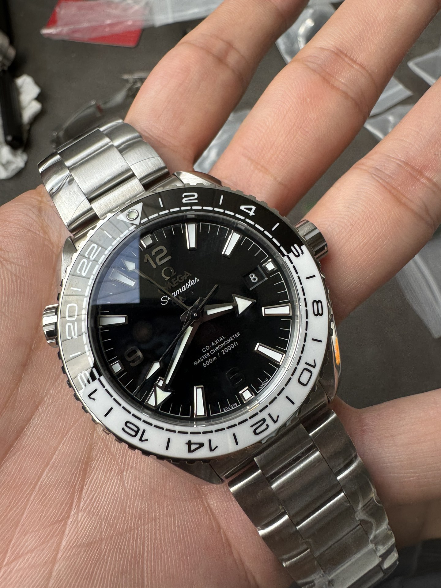 Super Clone 1:1 Omega Seamaster Planet Ocean GMT – Black Dial / Black-White Ceramic Bezel / Stainless Steel Bracelet