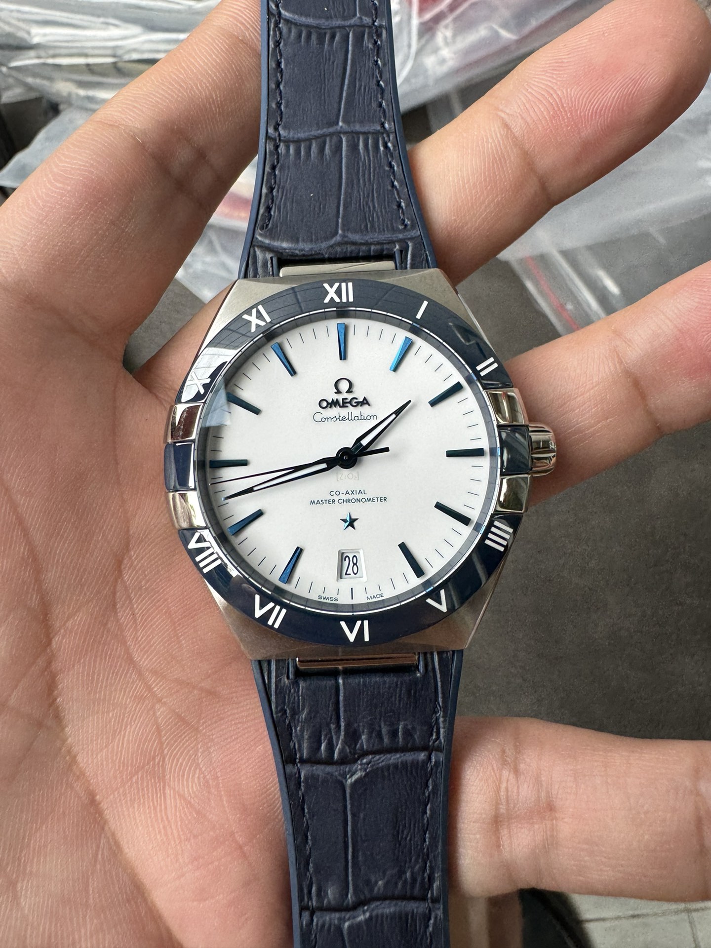 Super Clone 1:1 Omega Constellation Co-Axial Master Chronometer – White Dial Blue Roman Bezel Leather Strap