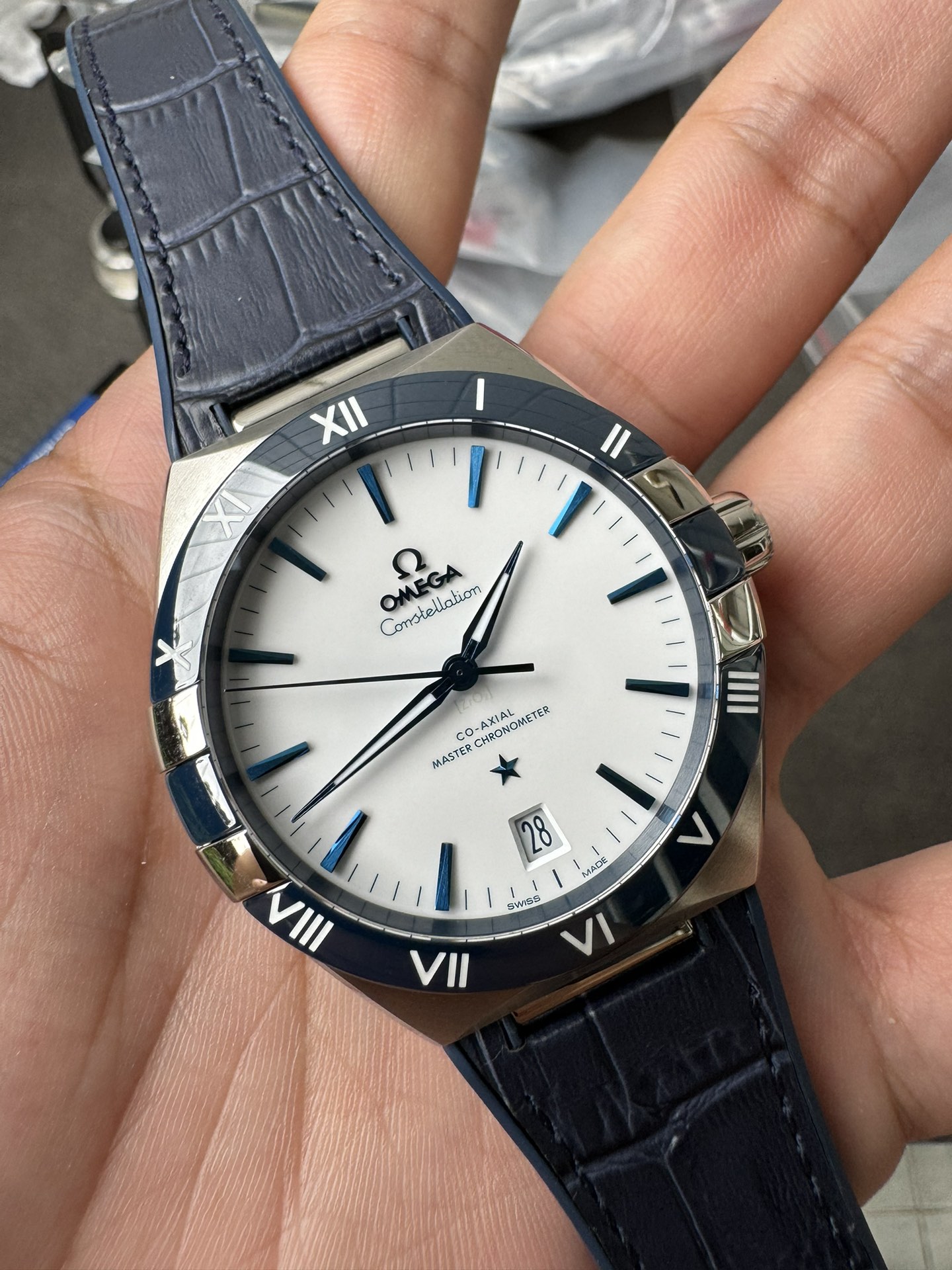 Super Clone 1:1 Omega Constellation Co-Axial Master Chronometer – White Dial Blue Roman Bezel Leather Strap