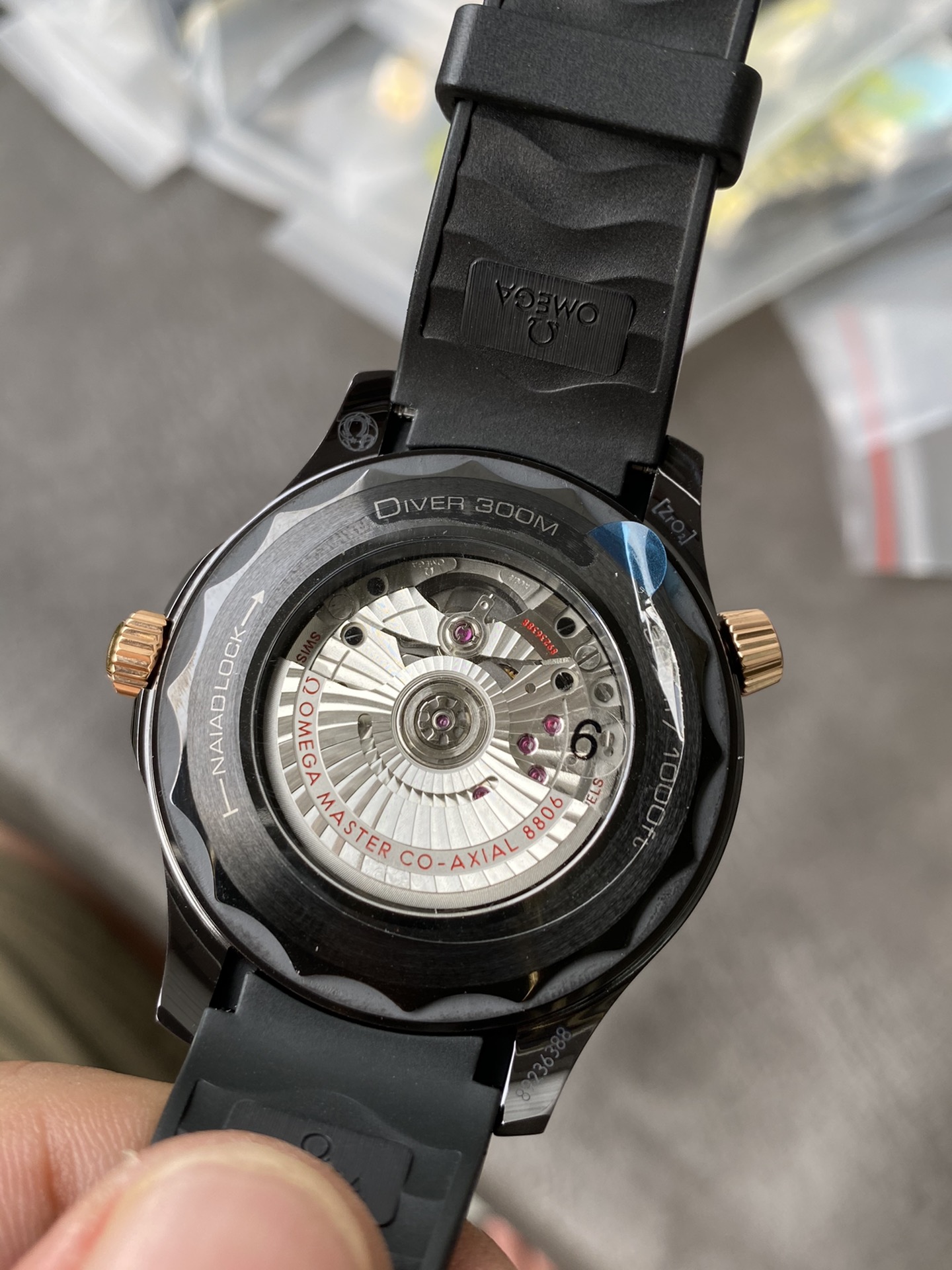 Super Clone 1:1 Omega Seamaster Diver 300M Black Ceramic & Sedna Gold – Rubber Strap / Co-Axial Master Chronometer