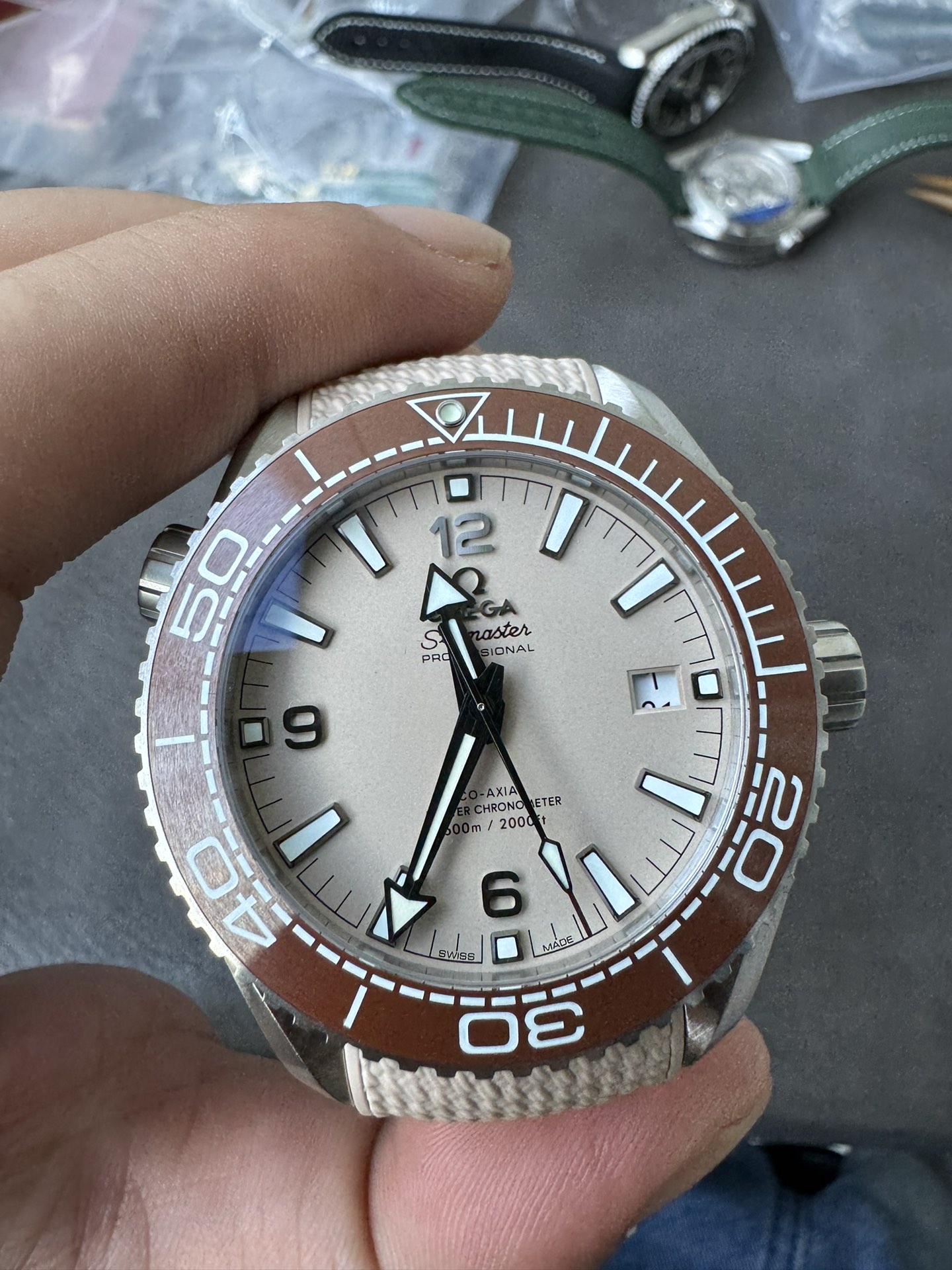 Super Clone 1:1 Omega Seamaster Planet Ocean 600M Cream Pink Dial Brown Ceramic Bezel Ladies Watch