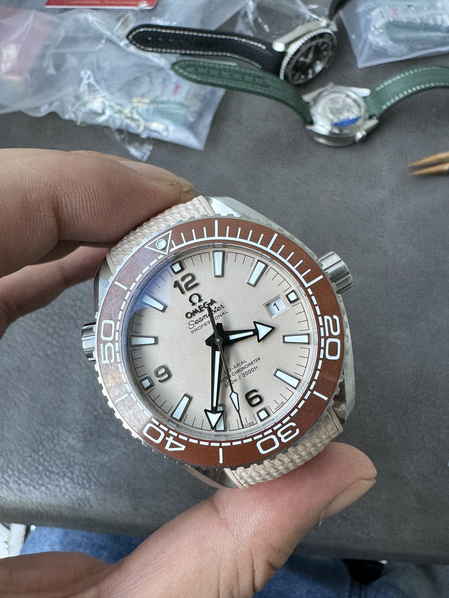 Super Clone 1:1 Omega Seamaster Planet Ocean 600M Cream Pink Dial Brown Ceramic Bezel Ladies Watch