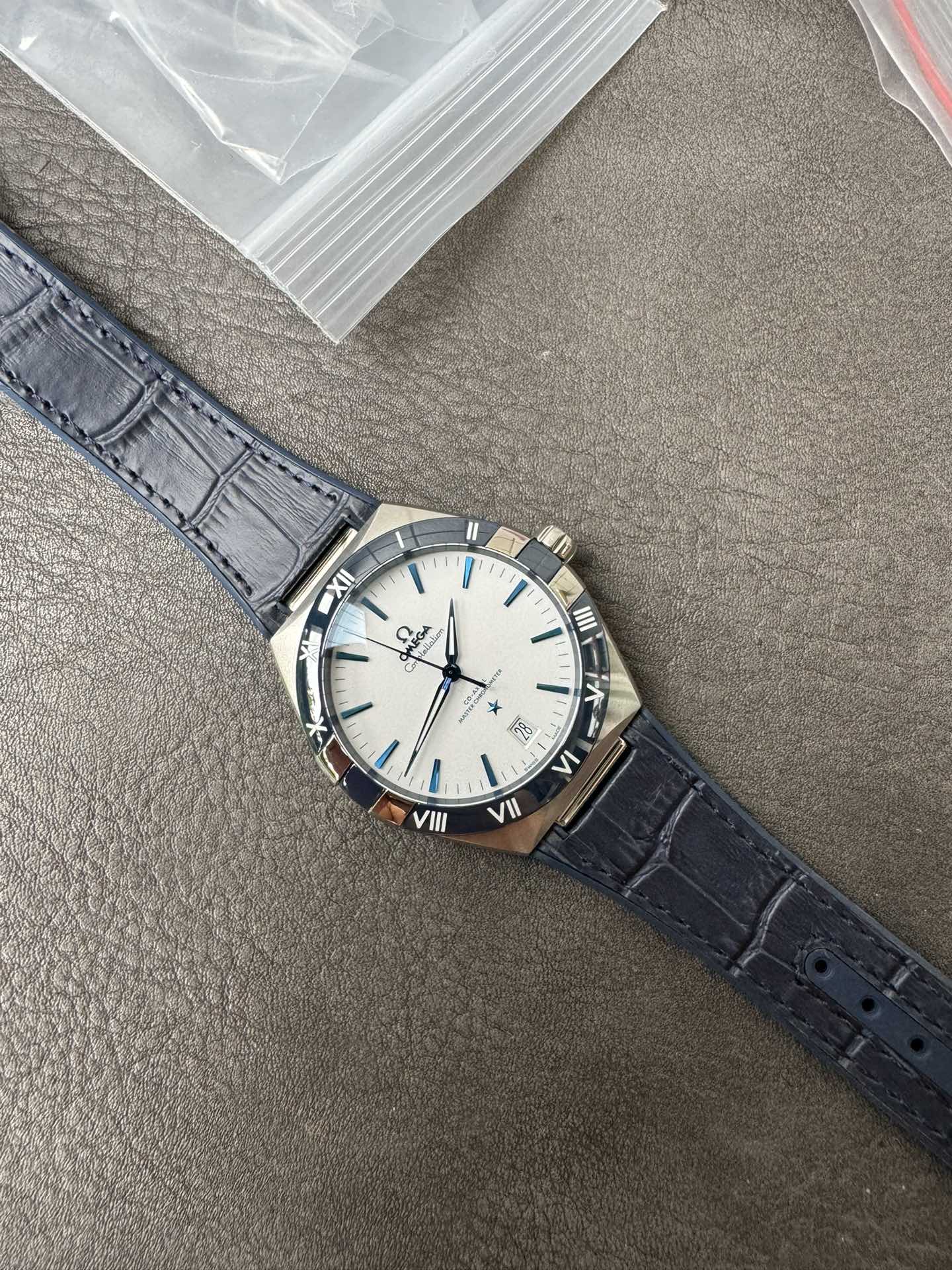 Super Clone 1:1 Omega Constellation Co-Axial Master Chronometer – White Dial Blue Roman Bezel Leather Strap
