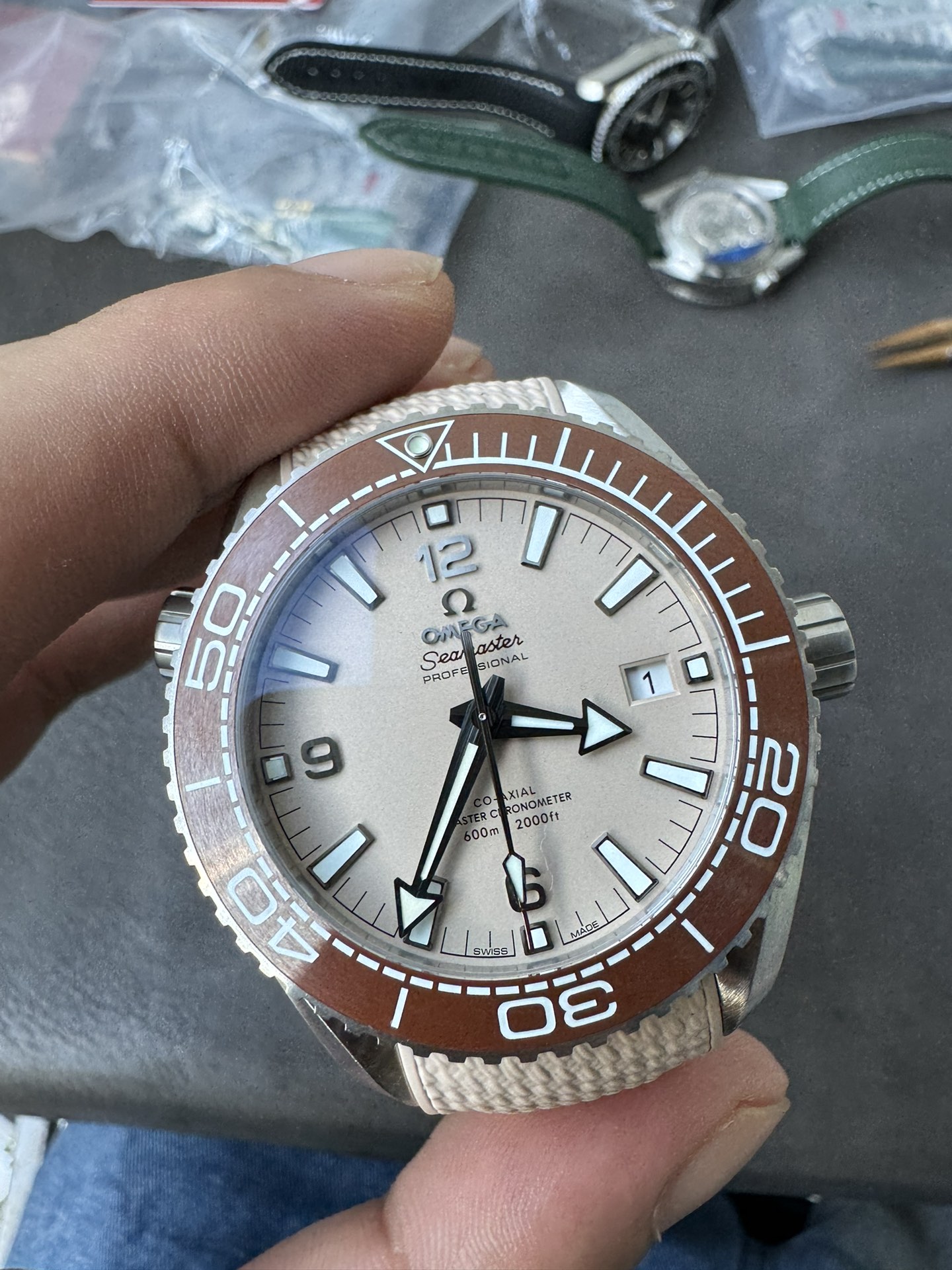 Super Clone 1:1 Omega Seamaster Planet Ocean 600M Cream Pink Dial Brown Ceramic Bezel Ladies Watch