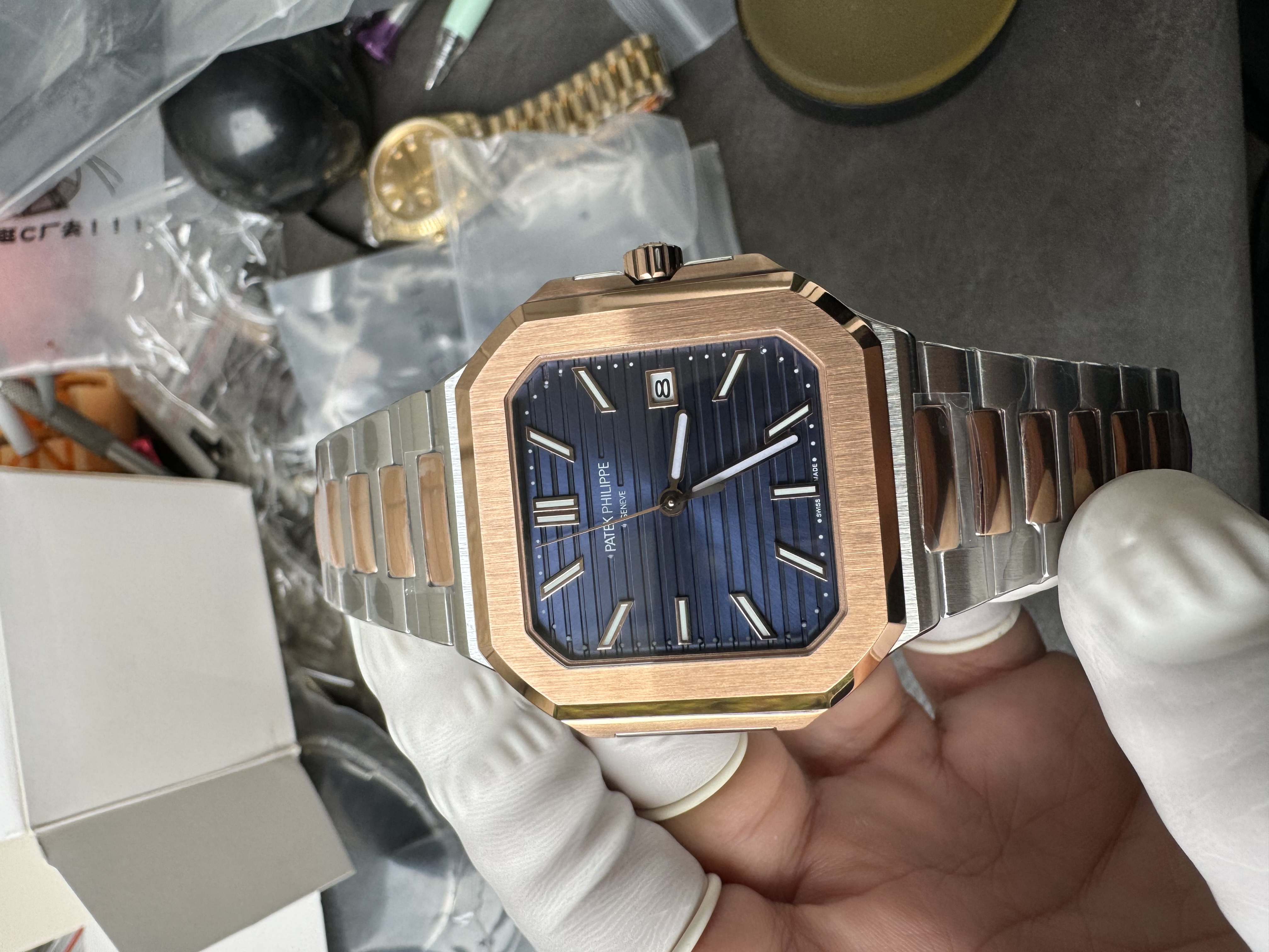 Super Clone 1:1 Patek Philippe 5821 Golden Ellipse Octagonal – Blue Dial / Rose Gold & Stainless Steel Two-Tone Bracelet / Date Display