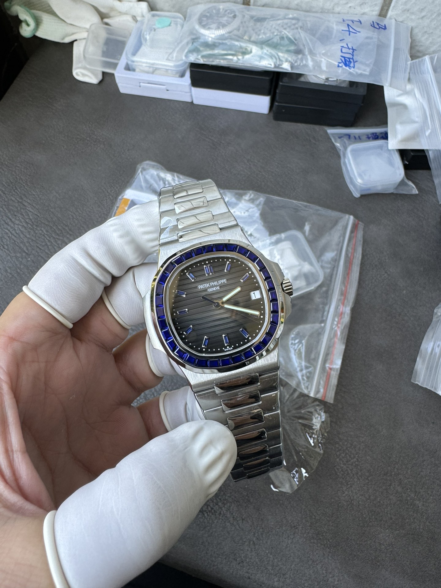 Super Clone 1:1 Patek Philippe Nautilus Date – Grey Gradient Dial / Blue Sapphire Bezel / Full Stainless Steel