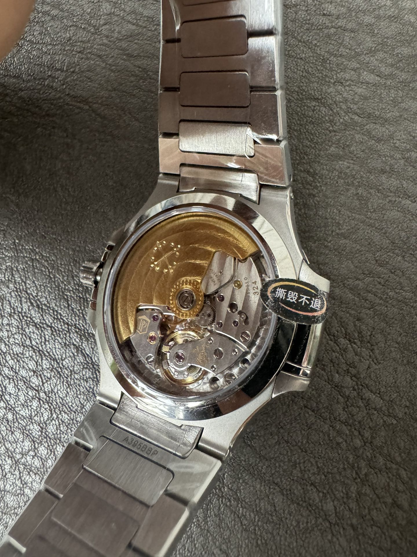 Super Clone 1:1 Patek Philippe Nautilus 7118/1A – Stainless Steel / Silver Embossed Dial