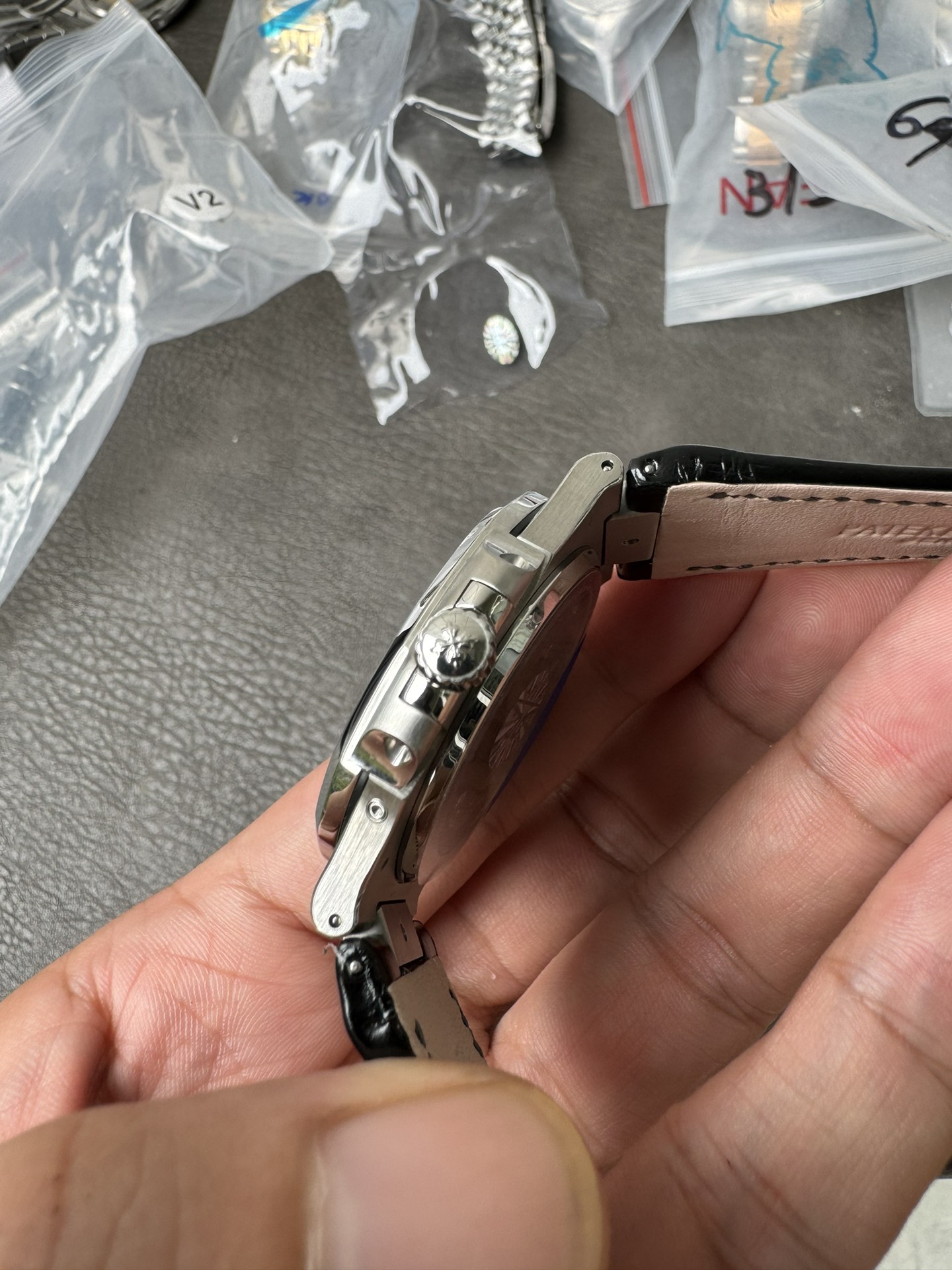 Super Clone 1:1 Patek Philippe Nautilus 5712G – White Gold / Black Textured Dial / Moonphase & Power Reserve Display / Black Leather Strap