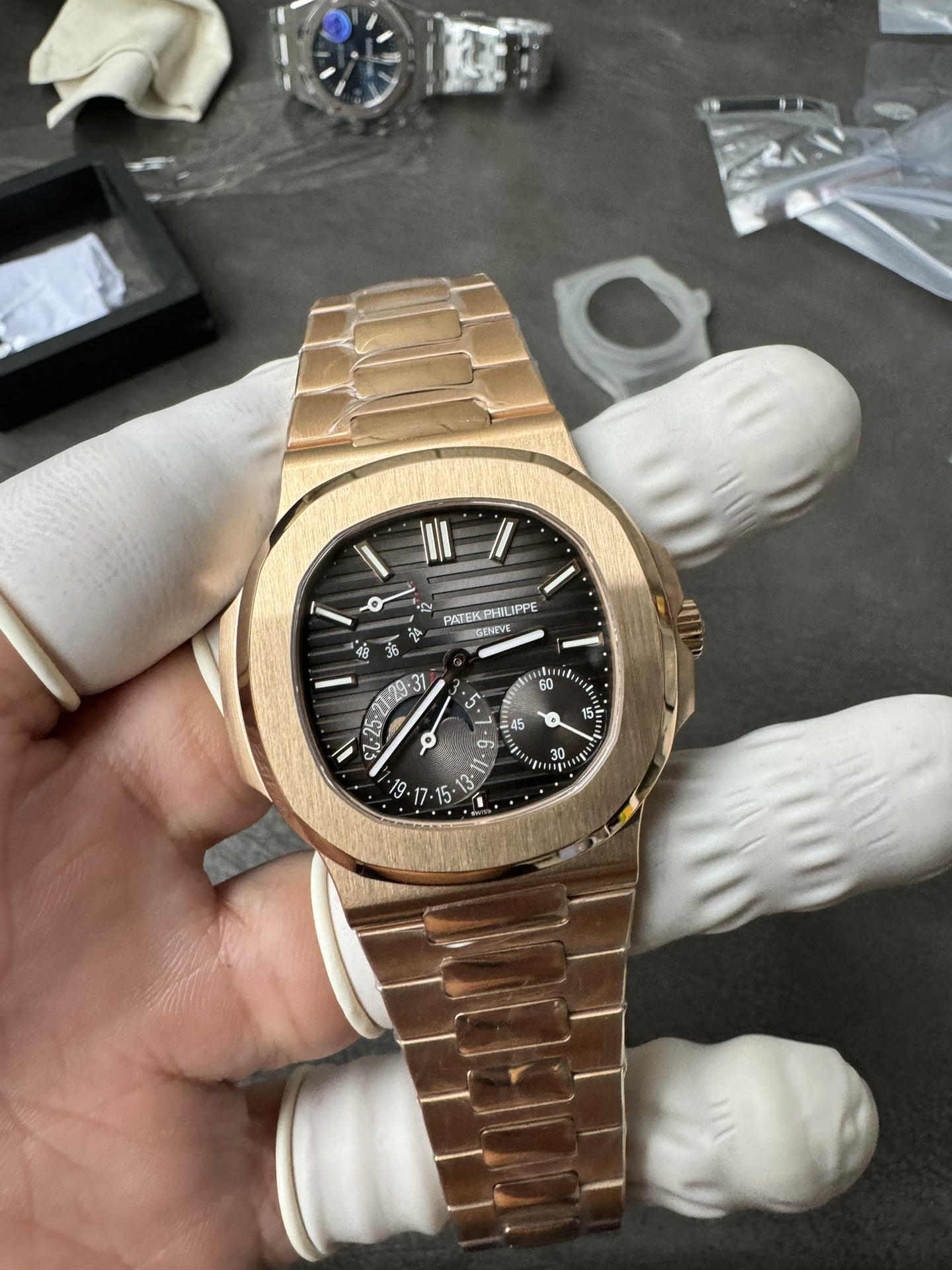 Super Clone 1:1 Patek Philippe Nautilus 5712R – Rose Gold / Black Textured Dial / Moonphase & Power Reserve Display / Upgraded Double Push Button Clasp