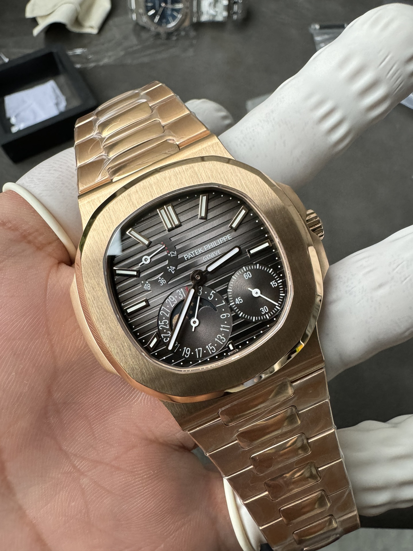 Super Clone 1:1 Patek Philippe Nautilus 5712R – Rose Gold / Black Textured Dial / Moonphase & Power Reserve Display / Upgraded Double Push Button Clasp