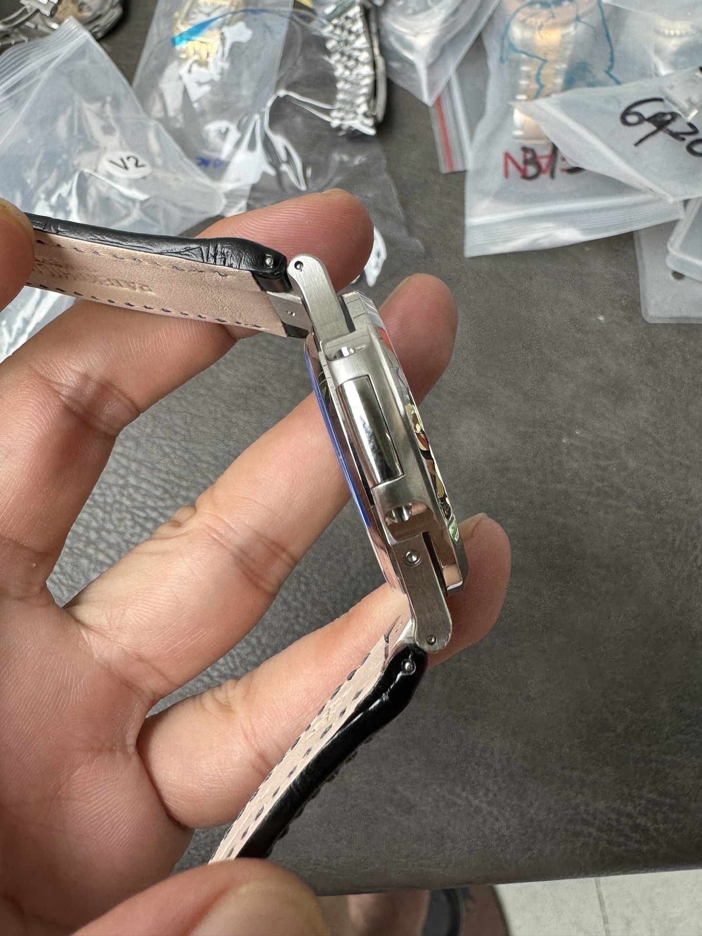 Super Clone 1:1 Patek Philippe Nautilus 5712G – White Gold / Black Textured Dial / Moonphase & Power Reserve Display / Black Leather Strap