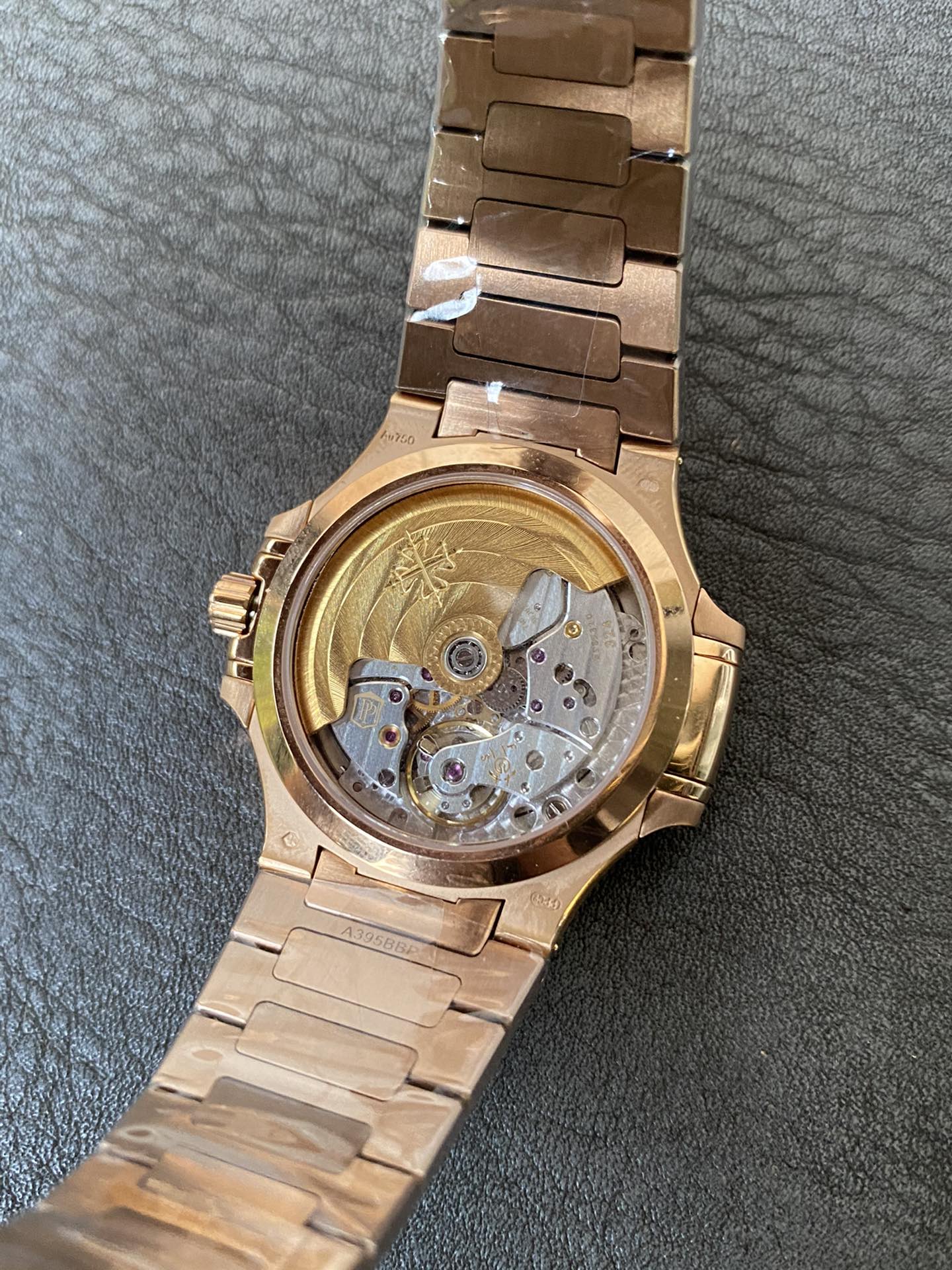 Super Clone 1:1 Patek Philippe Nautilus 7118/1R – Rose Gold / White Embossed Dial