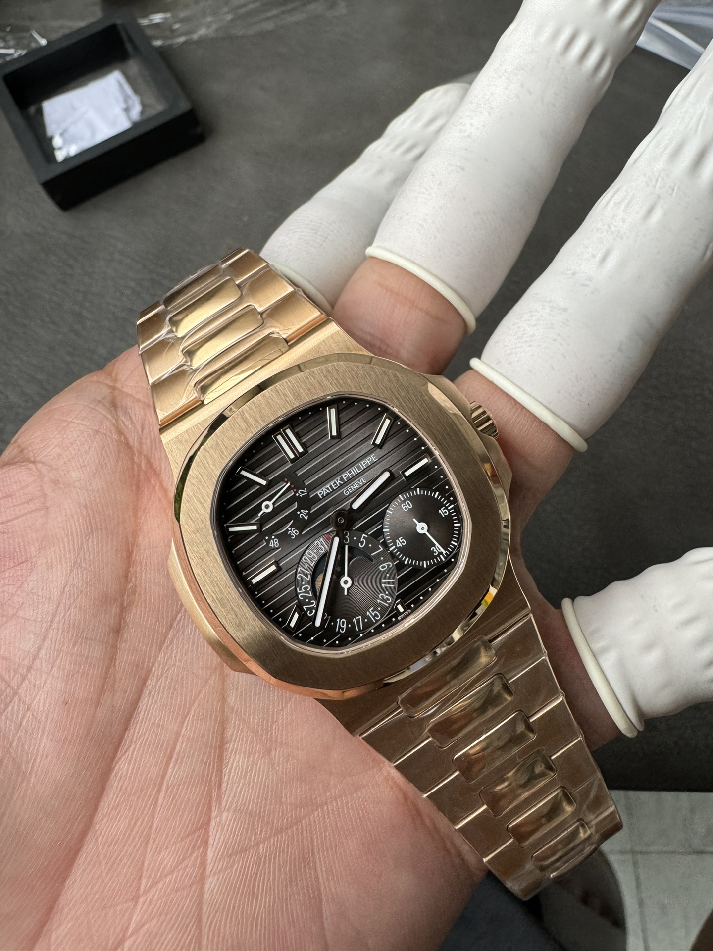 Super Clone 1:1 Patek Philippe Nautilus 5712R – Rose Gold / Black Textured Dial / Moonphase & Power Reserve Display / Upgraded Double Push Button Clasp