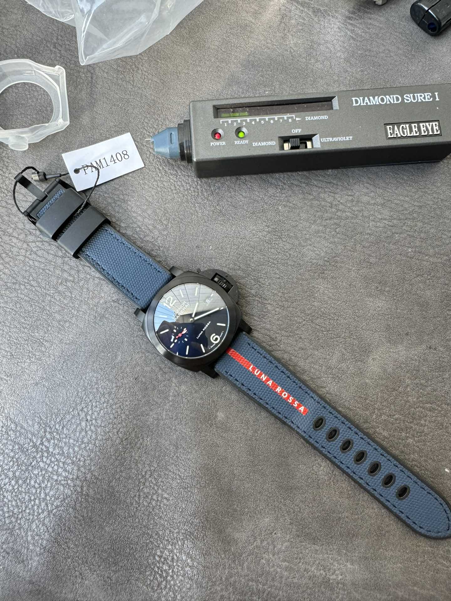 Super Clone 1:1 Panerai Luminor Luna Rossa PAM01408 – Black Dial / 44mm / Blue & Red Fabric Strap