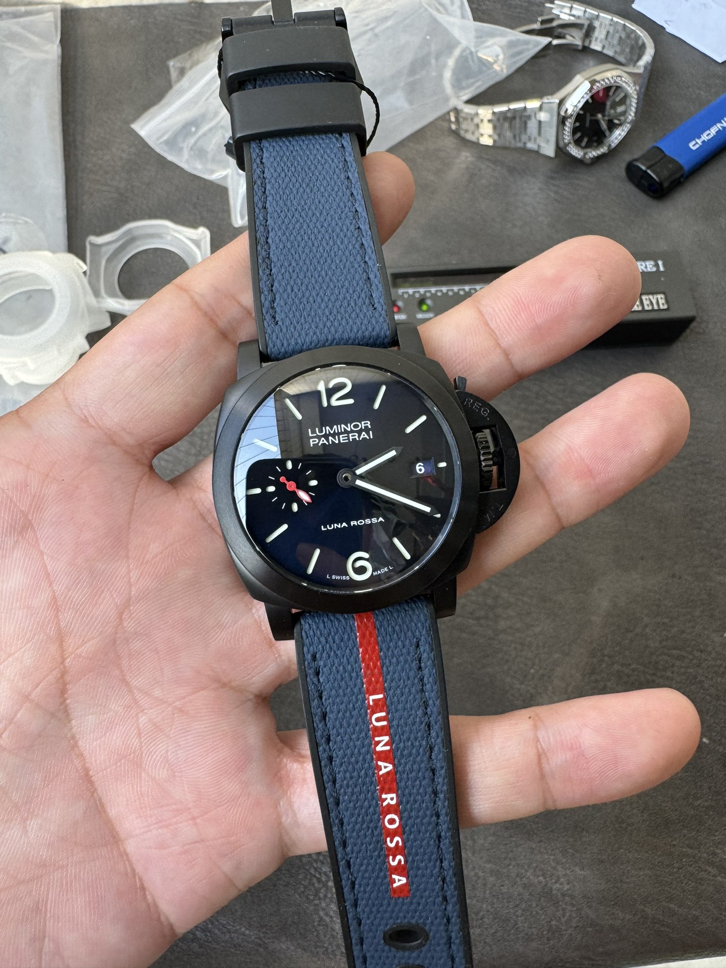 Super Clone 1:1 Panerai Luminor Luna Rossa PAM01408 – Black Dial / 44mm / Blue & Red Fabric Strap
