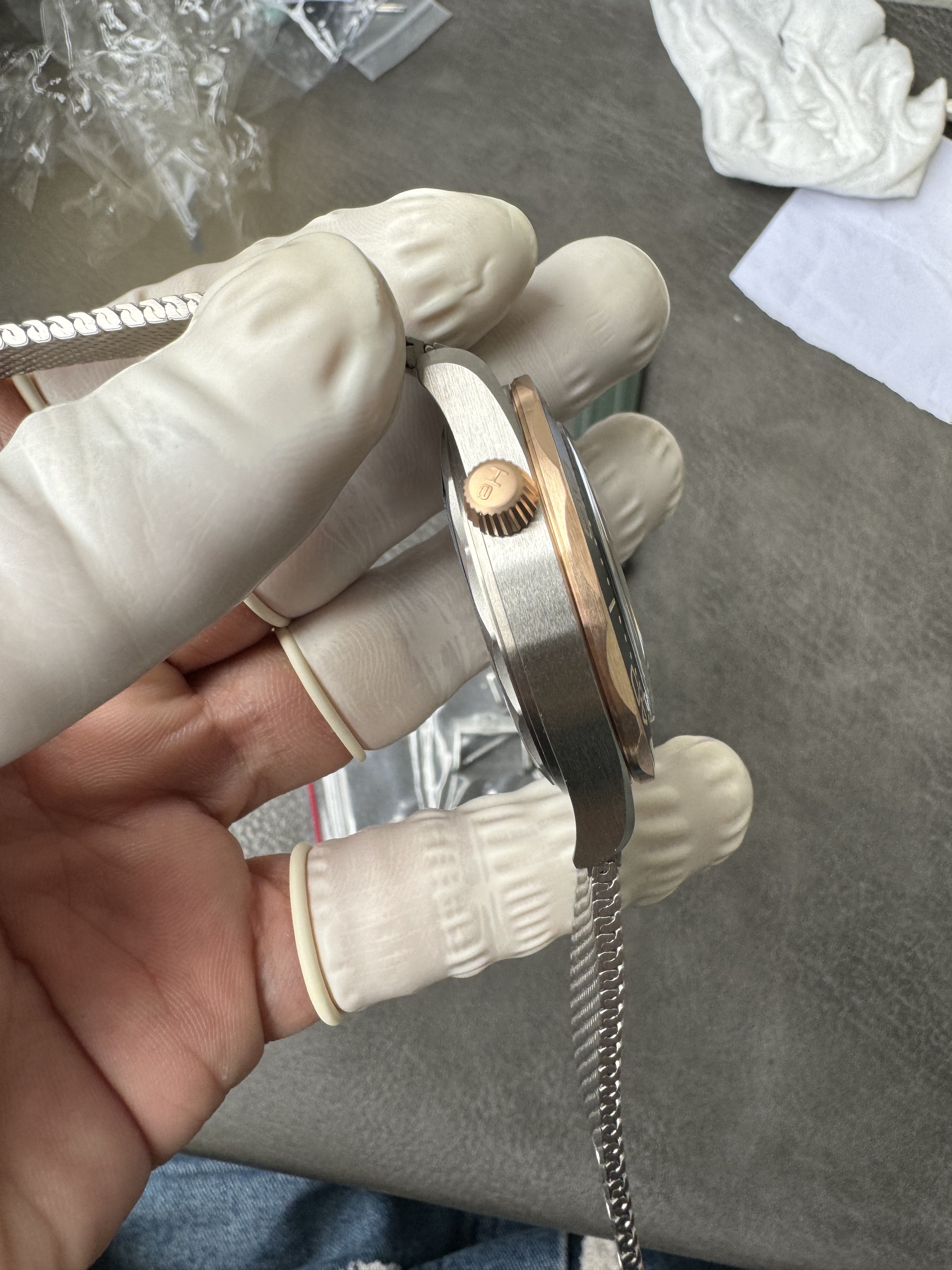 Super Clone OMEGA 1:1  Seamaster 300M 007 Edition 2025 Bronze Gold with Titanium Mesh Strap 42mm Diver Watch