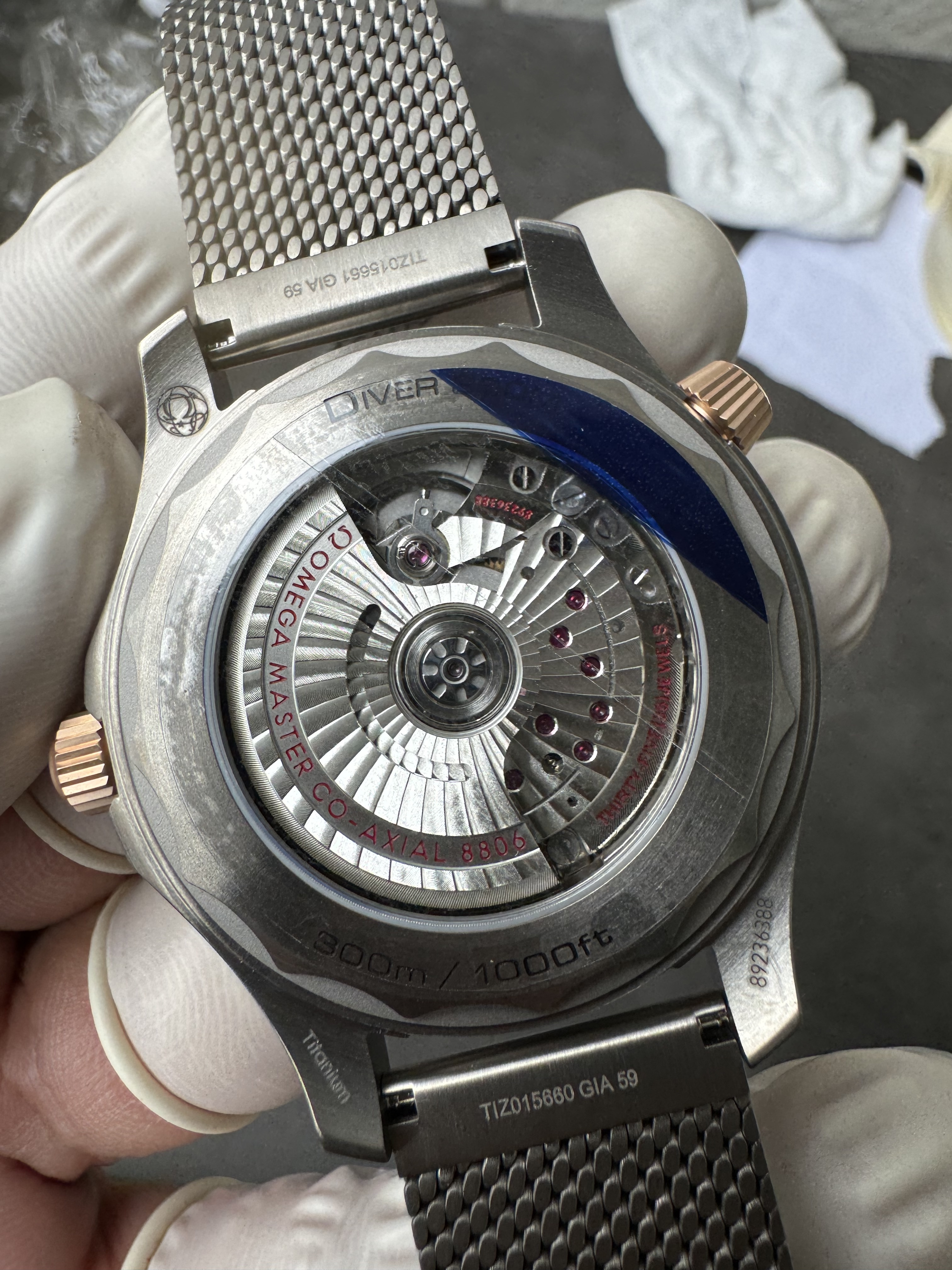 Super Clone OMEGA 1:1  Seamaster 300M 007 Edition 2025 Bronze Gold with Titanium Mesh Strap 42mm Diver Watch