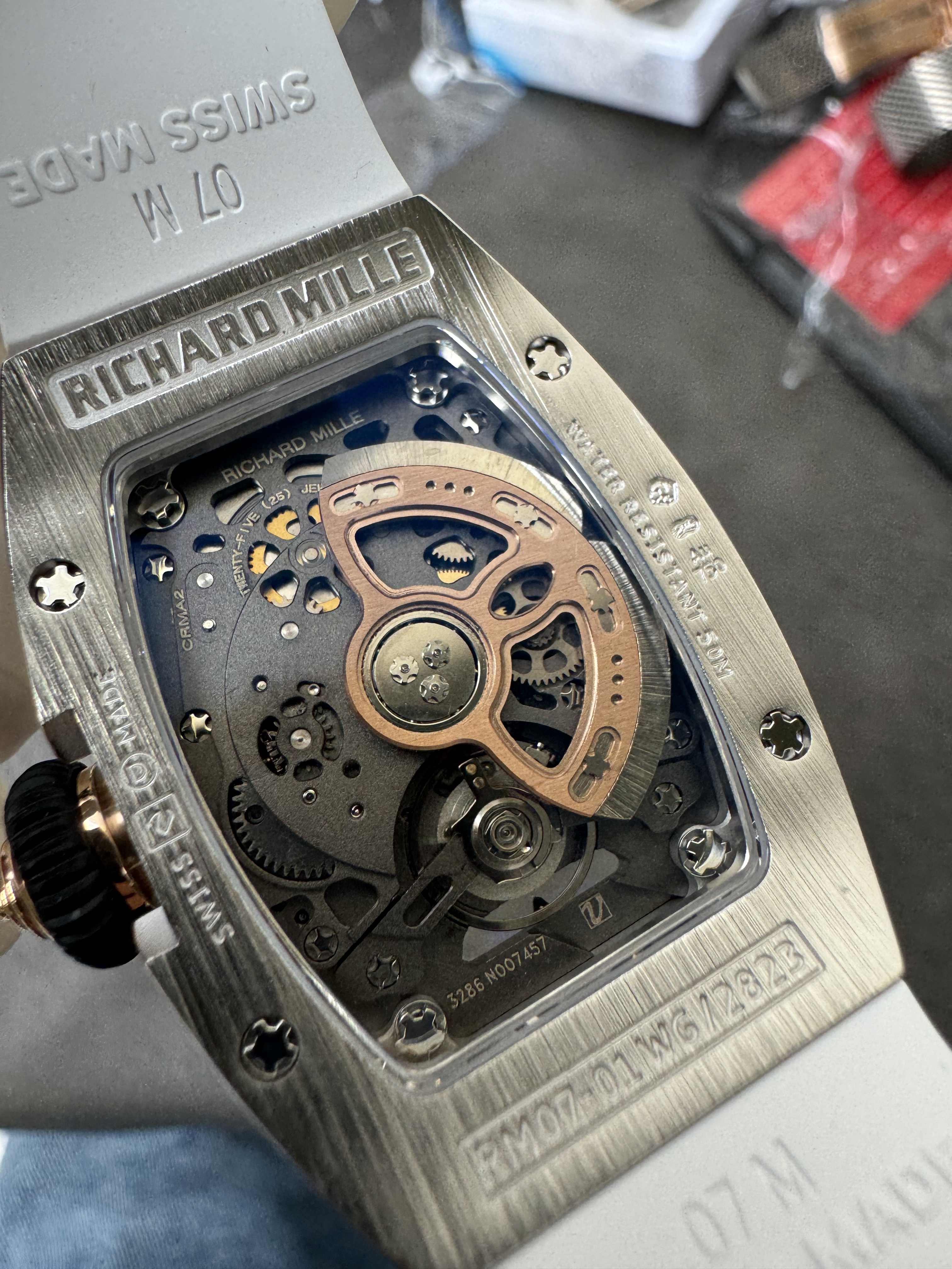 Super Clone Richard Mille RM 07-01 White Full Diamond Ladies Watch with Red Center Inlay & Gem-Set Bridge