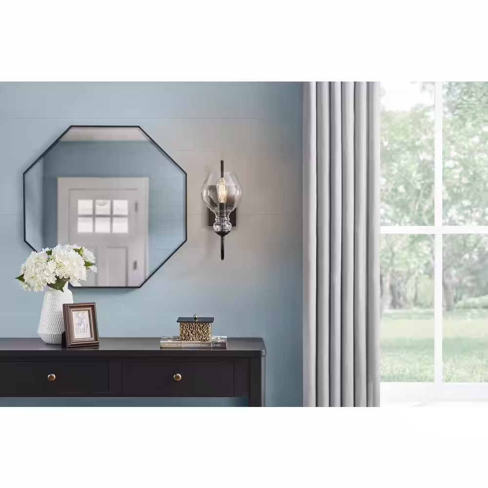 Home Decorators Collection Bakerston 1-Light Matte Black Wall Sconce with Clear Glass Shade