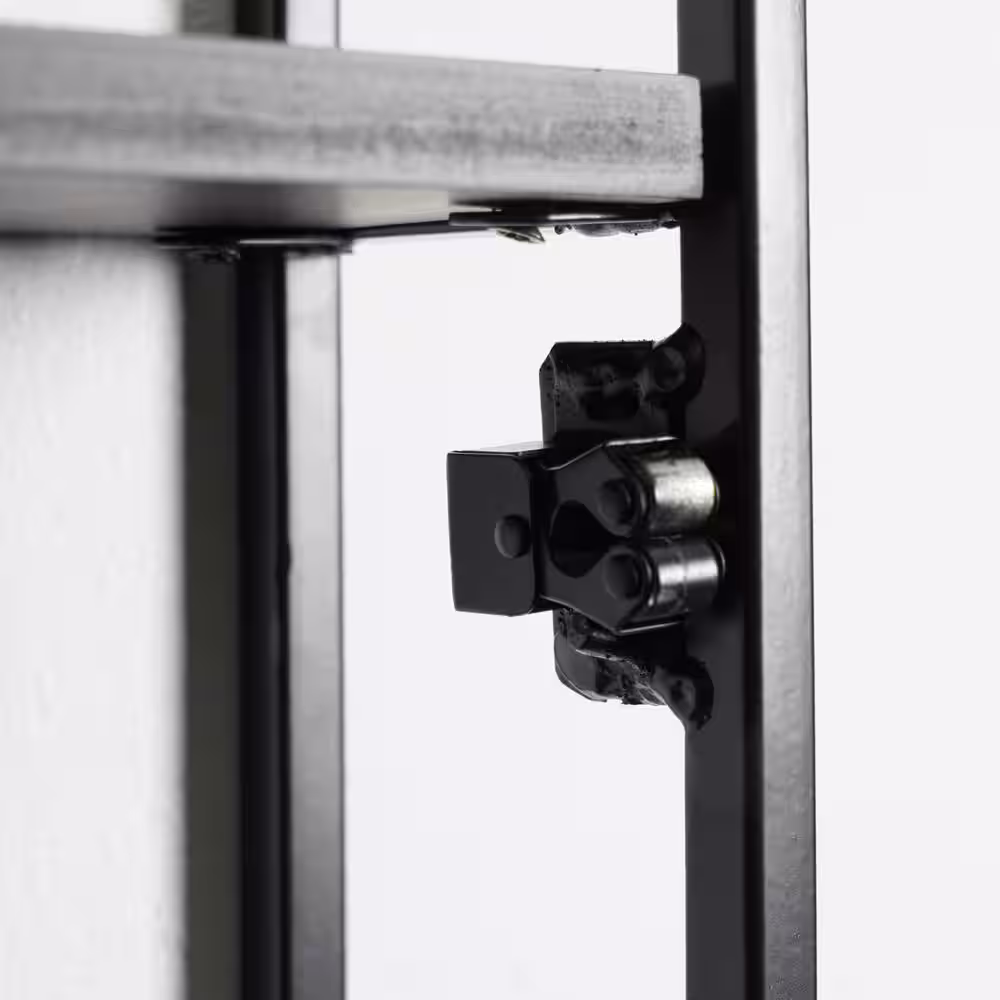 Head West 15 in. W x 30 in. H Oval Metal Framed Vanity Wall Mirror with Shelves in Black