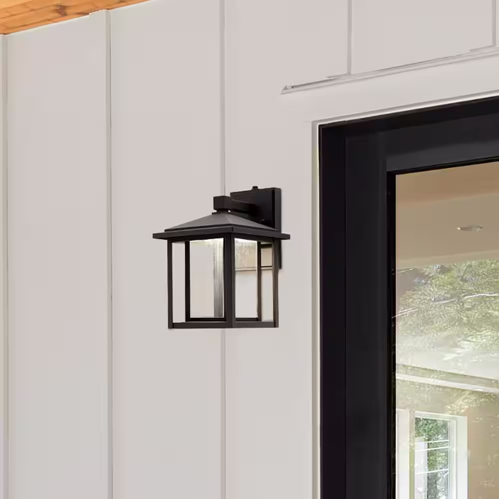 Maxxima 1-Light Black LED Outdoor Wall Lantern Sconce with Seeded Glass and Dusk to Dawn Sensor (1-Pack)