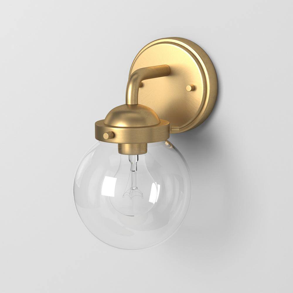 Designers Fountain Knoll 5.75 in. 1-light Brushed Gold Retro Modern indoor vanity with Clear Glass Shade