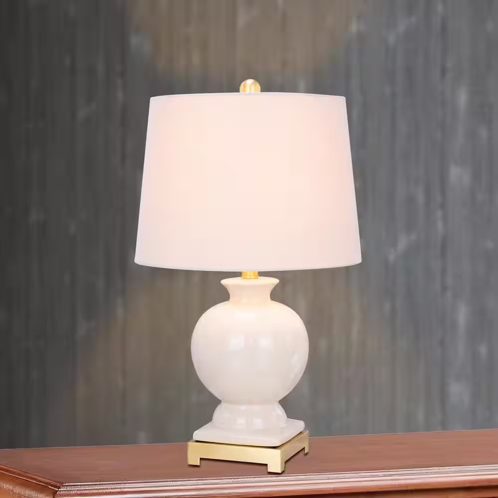 Fangio Lighting 24 in. Eggshell with Clear Crackle Ceramic and Satin Brass Metal Table Lamp