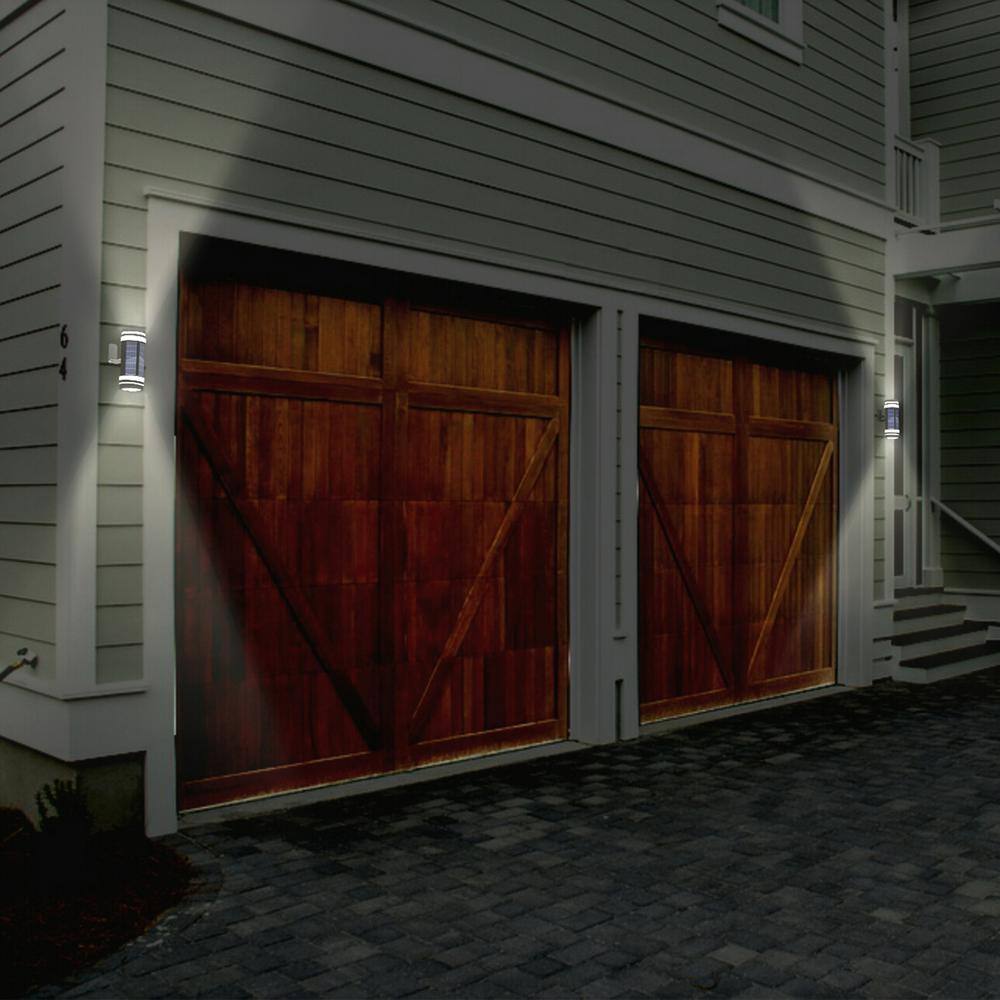 TECHKO Solar Wall Lights Cylinder Dual Direction Black Lantern Outdoor Solar Wall Mount Yellow/White Integrated LED